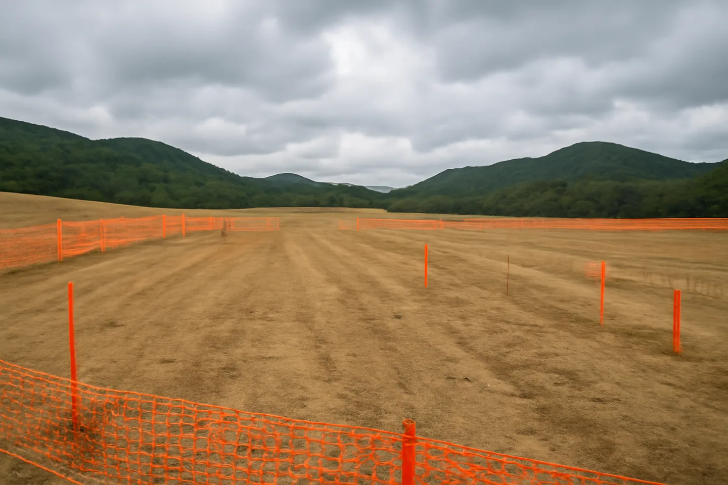 Graded construction lot with utility stakes